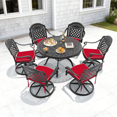 Table de salle à manger d'extérieur ronde en aluminium moulé de 47,24 pouces avec trou pour parasol et 6 chaises pivotantes avec coussins rouges (ensemble de 7 pièces)