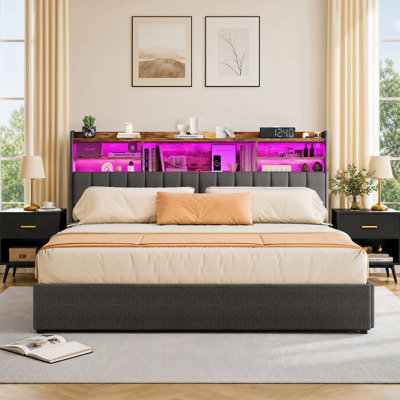King Bed Frame with 4 Storage Drawers and Wheels, Platform Metal Bed Frame with LED Light and Charging Station, Upholstered Platform Bed with Storage Shelves, No Box Spring Needed, Noise-Free, Grey.
