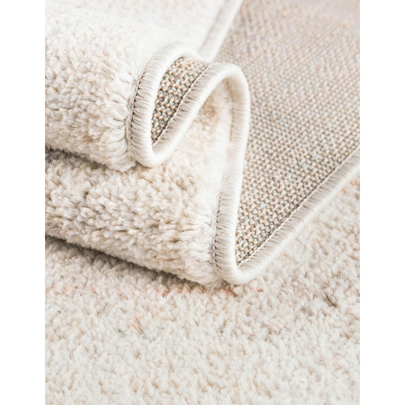 Hagood Oriental Area Rug in Ivory, Oval 2' x 3'1"