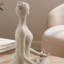 Figurine de yoga en résine et pierre beige 7X4x9
