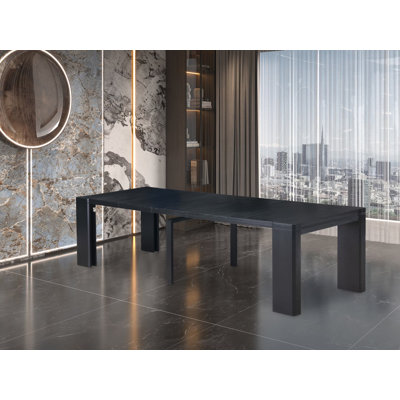Table de salle à manger extensible - plateau de table rectangulaire avec rallonge amovible et pieds élégants, finition noire brossée
