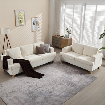 Chaise d'appoint entièrement assemblée avec finition grain de bois vieilli et accoudoirs garnis de têtes de clou