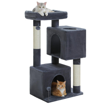 Cat tower with 2 spacious caves, thickened scratching posts, large rooftop resting area, and 2 interactive toys