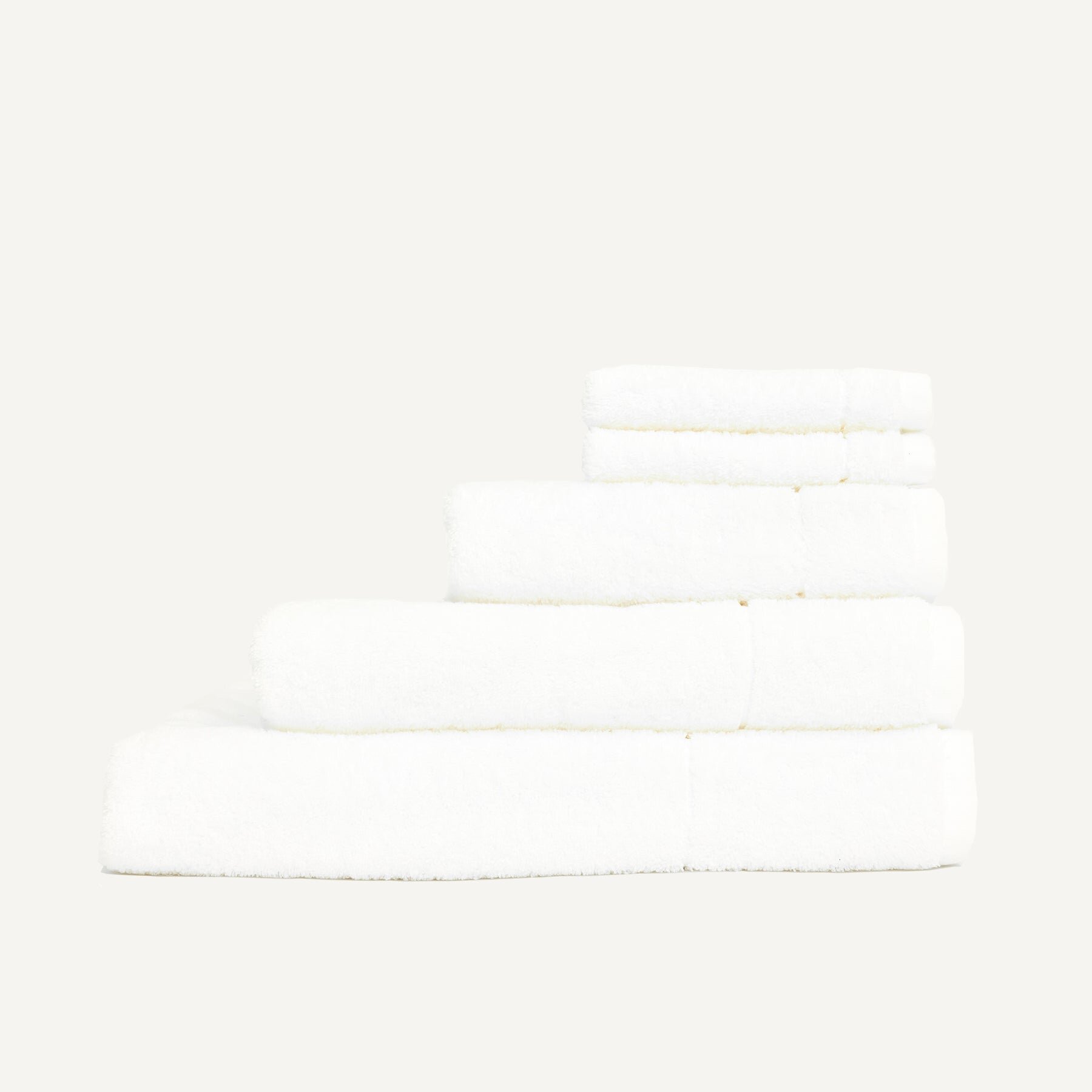 https://assets.wfcdn.com/im/45103380/compr-r85/1897/189761491/essential-towels-5-pieces-100-cotton-towel-set.jpg