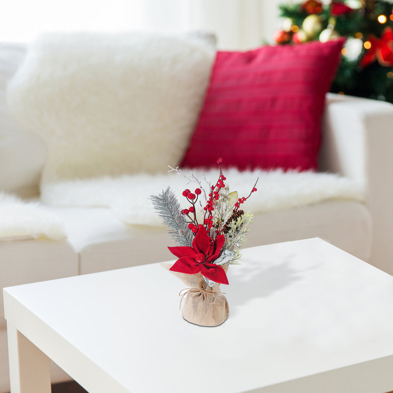Arrangement floral de poinsettias en pot