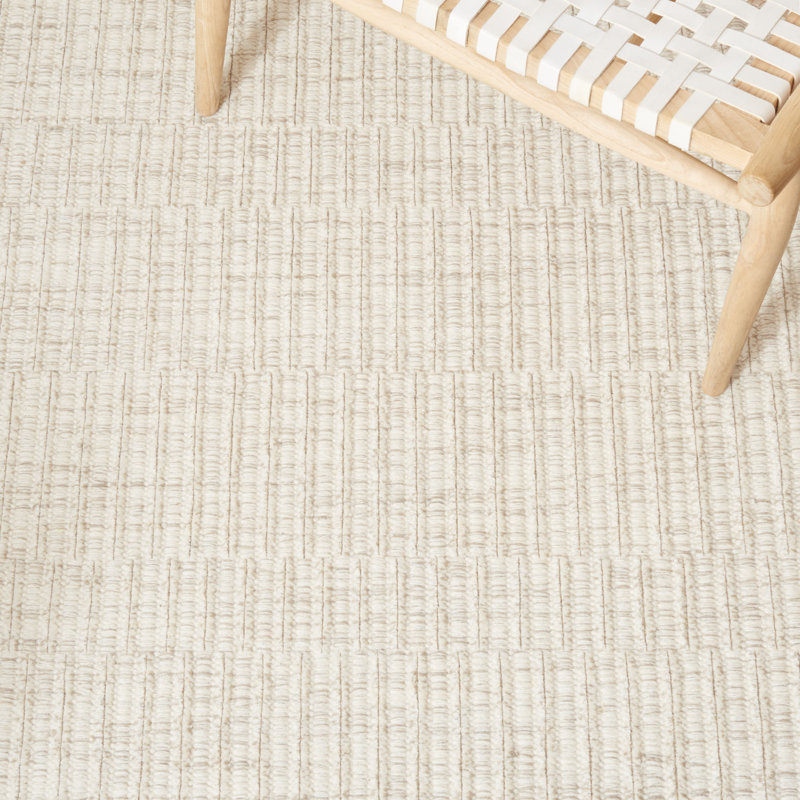 Ivory 8' x 10' Handmade Wool and Synthetic Tufted Rug