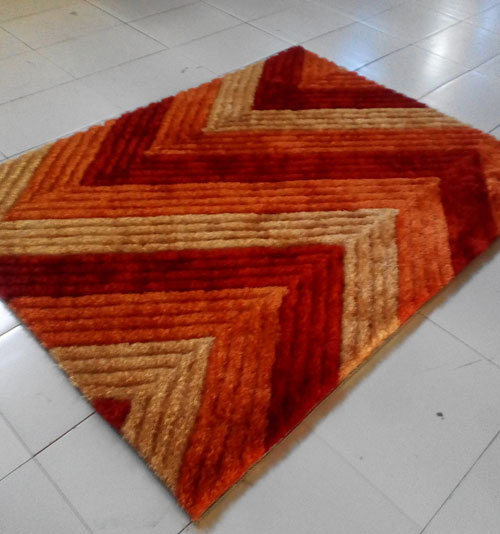 Tapis orange, 5 pi 3 po x 7 pi 2 po