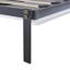 Lit escamotable avec tablettes ouvertes et tiroirs de rangement