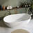 Oval 59''Freestanding Stone-Resin Soaking Tub – 21" Deep Soak, Matte White, Pop-Up Drain Included