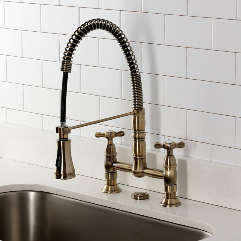 Kingston Brass Essex Double-Handle 2-Hole Deck-Mount Pre-Rinse Bridge Kitchen Faucet, Antique Brass
