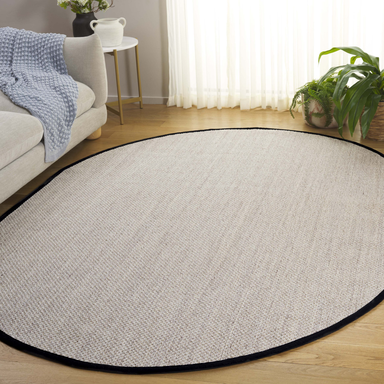 Torbin Marble Black Jute Rug, Oval 6' x 8'