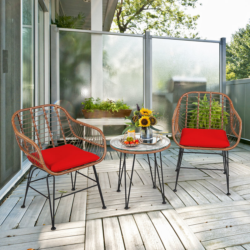 Brookley 2 - Person Wicker Patio Dining Set with Round Table , Cushions Included, Red, Brown