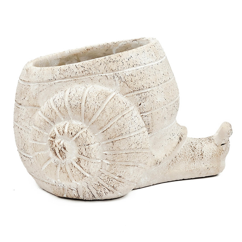La jardinière texturée beige sable et ciment 9,5 x 8,3 x 6 pouces, un accessoire décoratif pour votre pot à fleurs avec finition, ajoute un élément naturel à la pièce