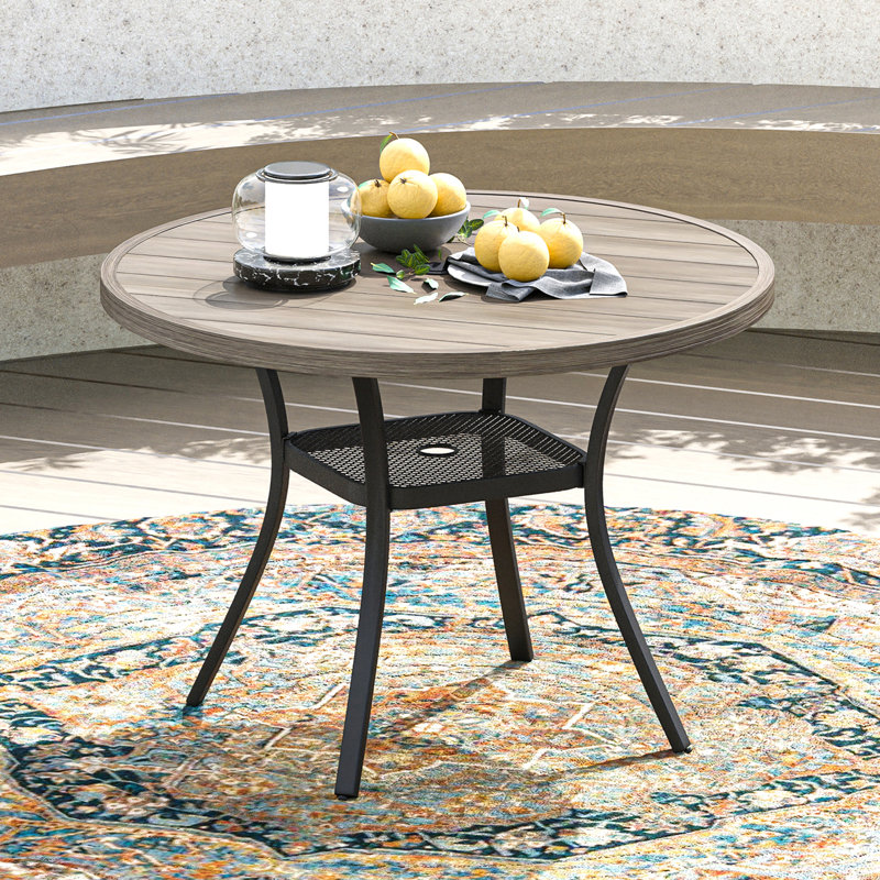 Teressa Round Metal Outdoor Dining Table With Umbrella Hole , 53'' in. W 53'' in. D, Brush Wood Gray/Black