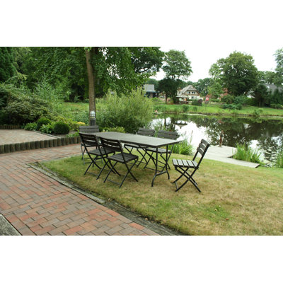 Brooxie 4 - Person Patio Dining Set with Rectangular Table