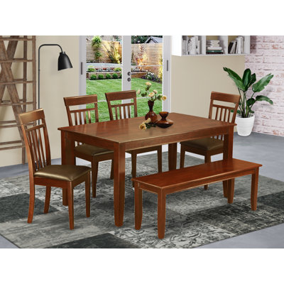 L'ensemble de table de salle à manger 6 pièces contient une table de cuisine rectangulaire et 4 chaises de salle à manger en similicuir avec un banc, acajou 
