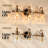 Almine 23" W 3-Light Iron Vanity Light with Textured Glass Shades