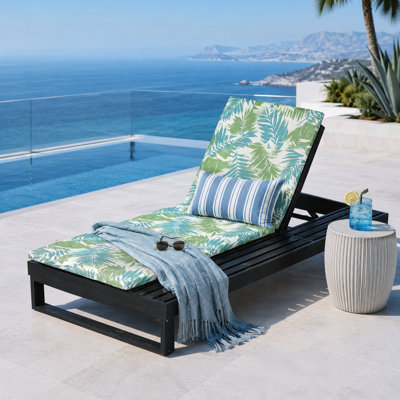 Chaise longue noire en bois d'acacia avec coussin à motif de feuilles tropicales et dossier inclinable réglable