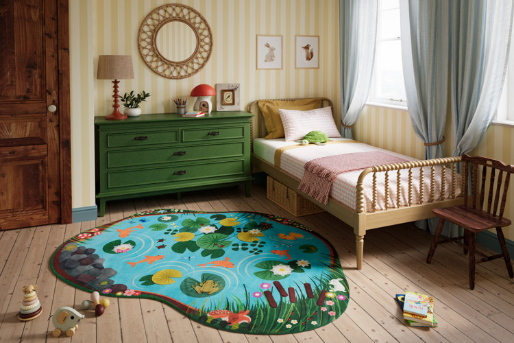 kid's bedroom with green dresser, wooden spindle bed, and animal-themed pond rug with frogs, fish, and lily pads