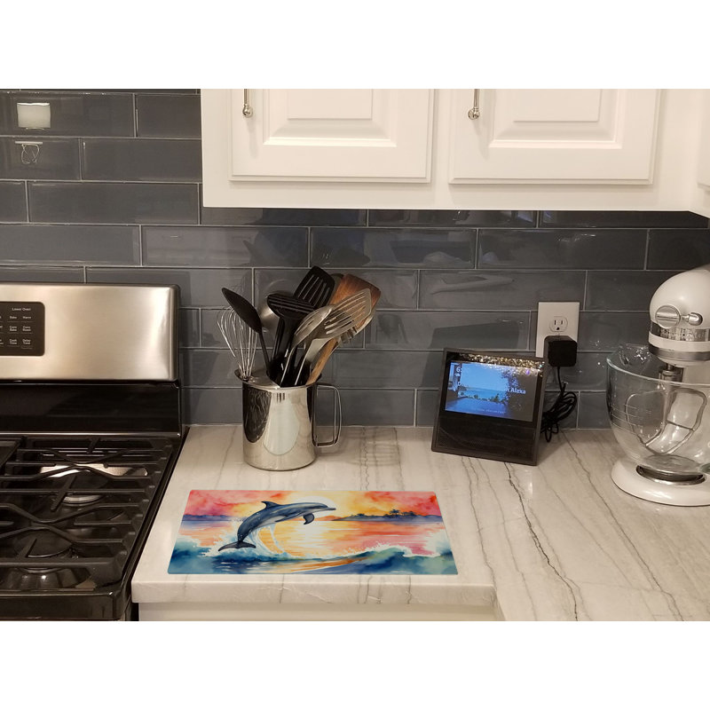 Dolphin Leaping at Sunrise Glass Cutting Board