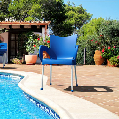 Goines Stacking Patio Dining Armchair by Ebern Designs