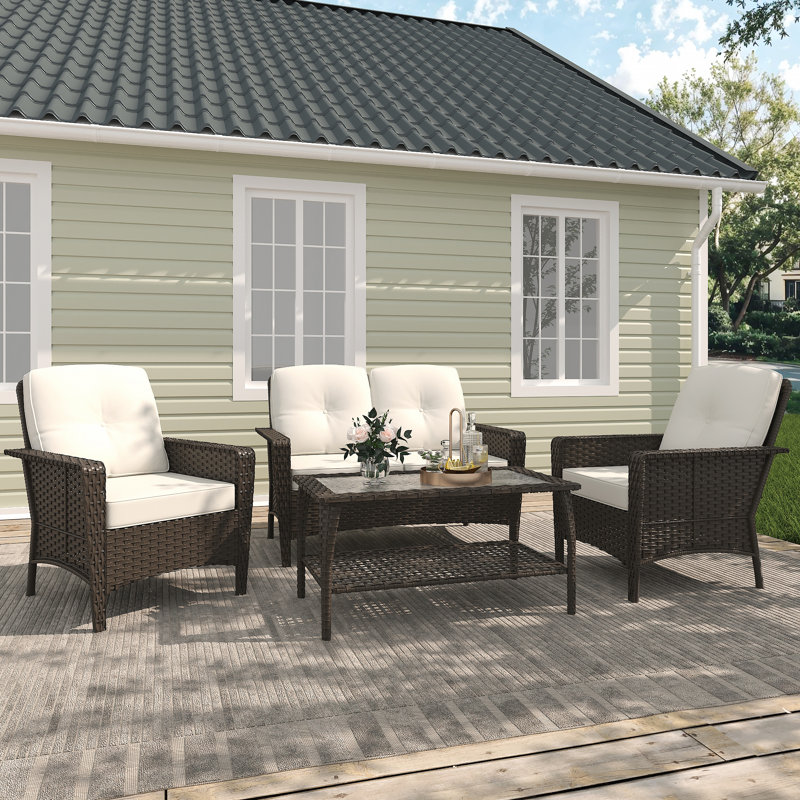 4-Piece Rattan Outdoor Sofa Seating Group with Cushions: Includes Loveseat, 2 Armchairs, and Coffee Table - Premium Patio Furniture for Backyard or Deck