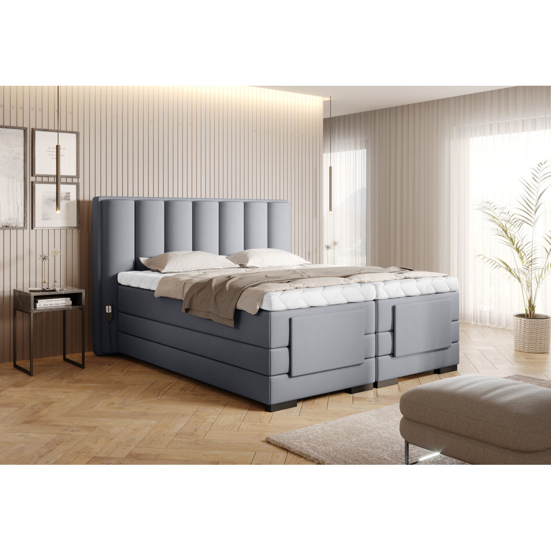 Elektrisch verstellbares Boxspringbett Arrigo mit Topper