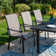 Basima Metal Patio Dining Set with Extendable Rectangular Table