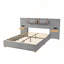 Grand lit plateforme tapissier avec ports de charge et tablettes de rangement