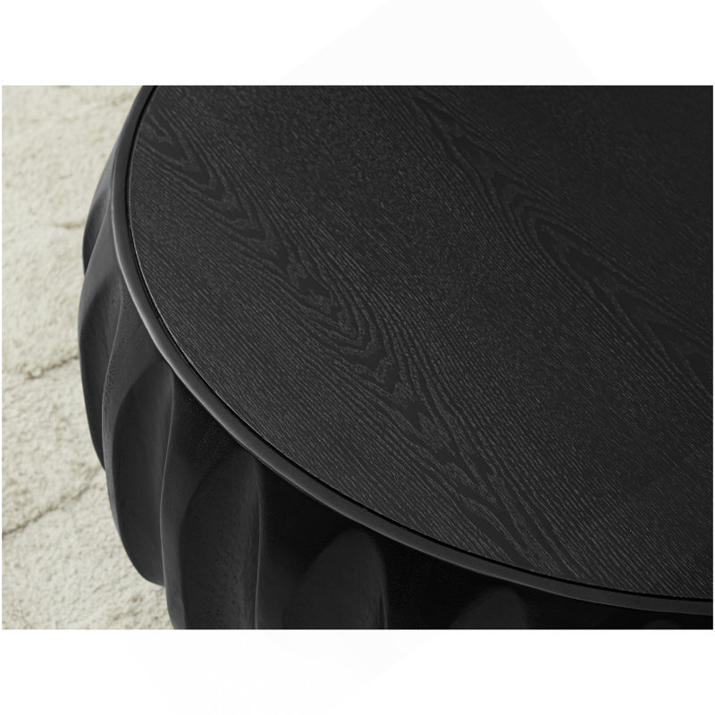 Table basse ronde en bois massif sculpté au design sculptural élégant, Noir