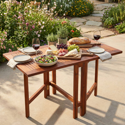 Kinner Folding Teak Dining Table