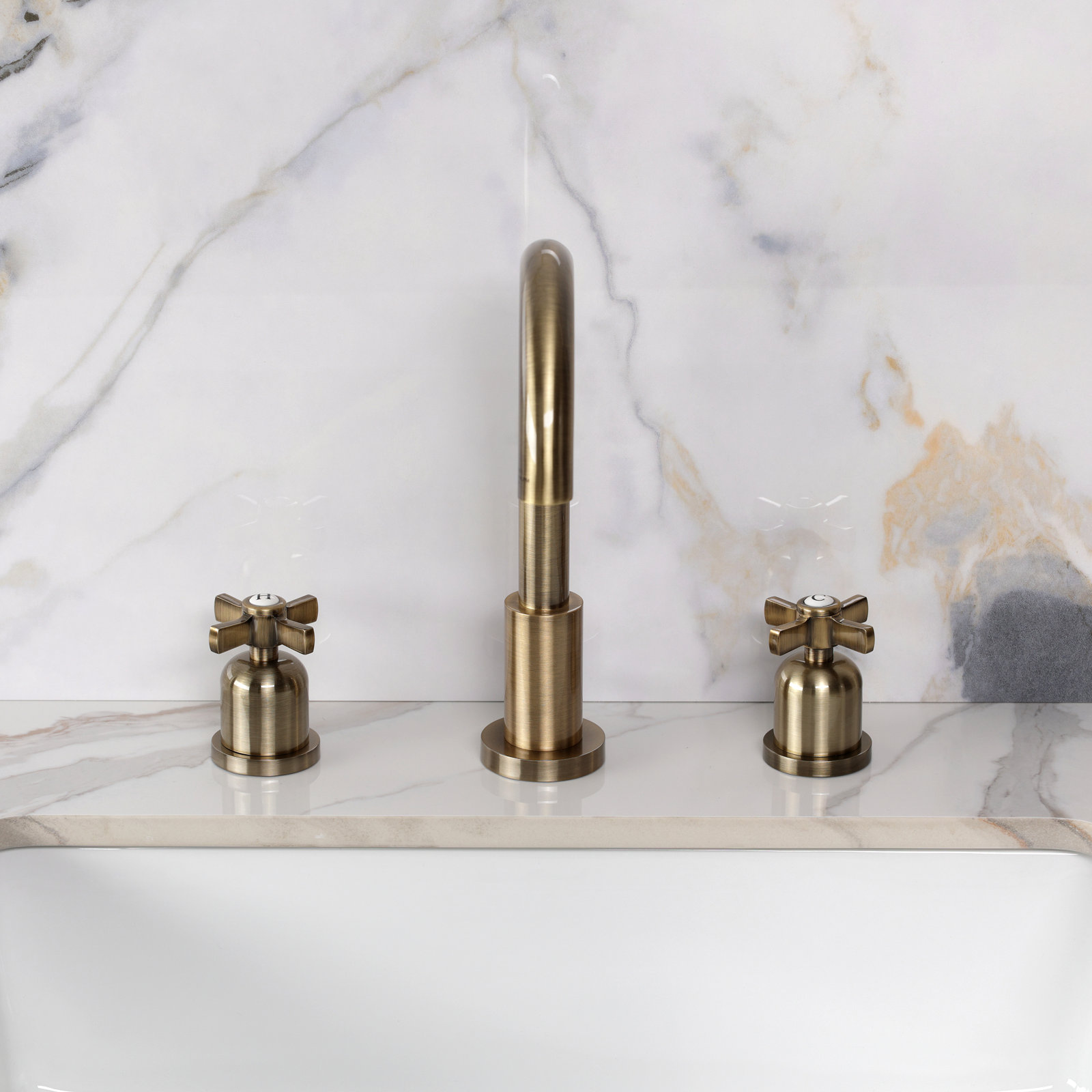 Kingston Brass Millennium Two-Handle 3-Hole Deck Mount Widespread Bathroom Faucet with Brass Pop-Up Drain, Antique Brass