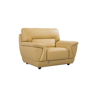 Fauteuil capitonné Alidade