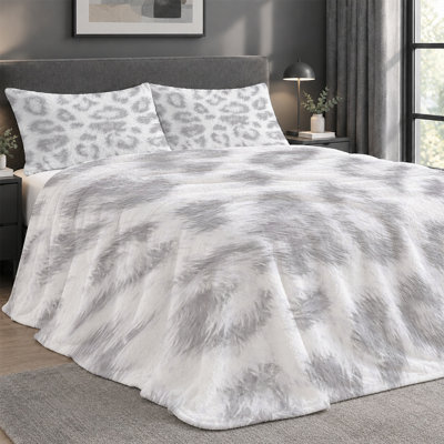 Ensemble de couverture légère en flanelle de qualité supérieure et 2 taies décoratives avec texture de fourrure à imprimé léopard blanc et gris, ensemble de literie confortable ultra-douce et chaude pour toutes saisons, couverture de 60 po x 80 po + 2 taies d'oreiller anti-boulochage et lavables à la machine (ensemble de 3 ))