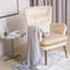Fauteuil capitonné et rembourré
