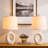 24" Modern Ceramic Table Lamp with Sculptural Ring Base and Polished Nickel Accents