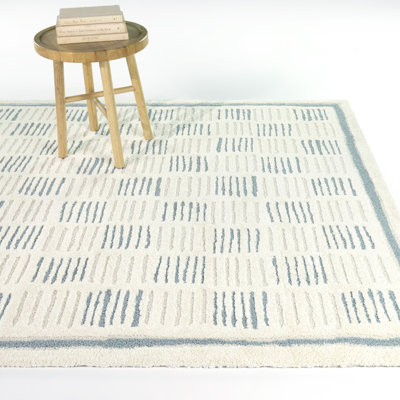 Guillaume Teal Checker Area Rug