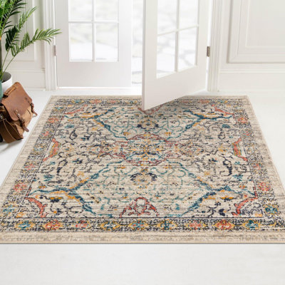 Alkire Floral Ivory/Navy/Yellow/Orange Area Rug