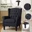 Fauteuil d'appoint à oreilles capitonné avec accoudoirs roulés et coussins épais Duward-1131008177