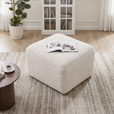Repose-pieds rond beige avec rangement réversible et pieds en bois Boucle