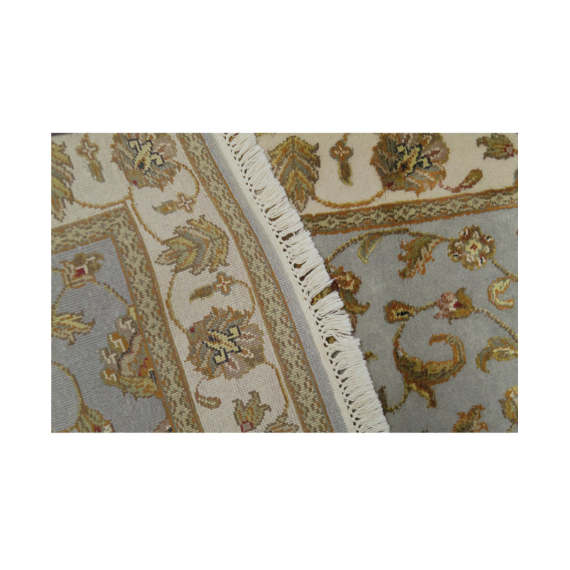 Tapis bleu et ivoire de haute qualité noué à la main