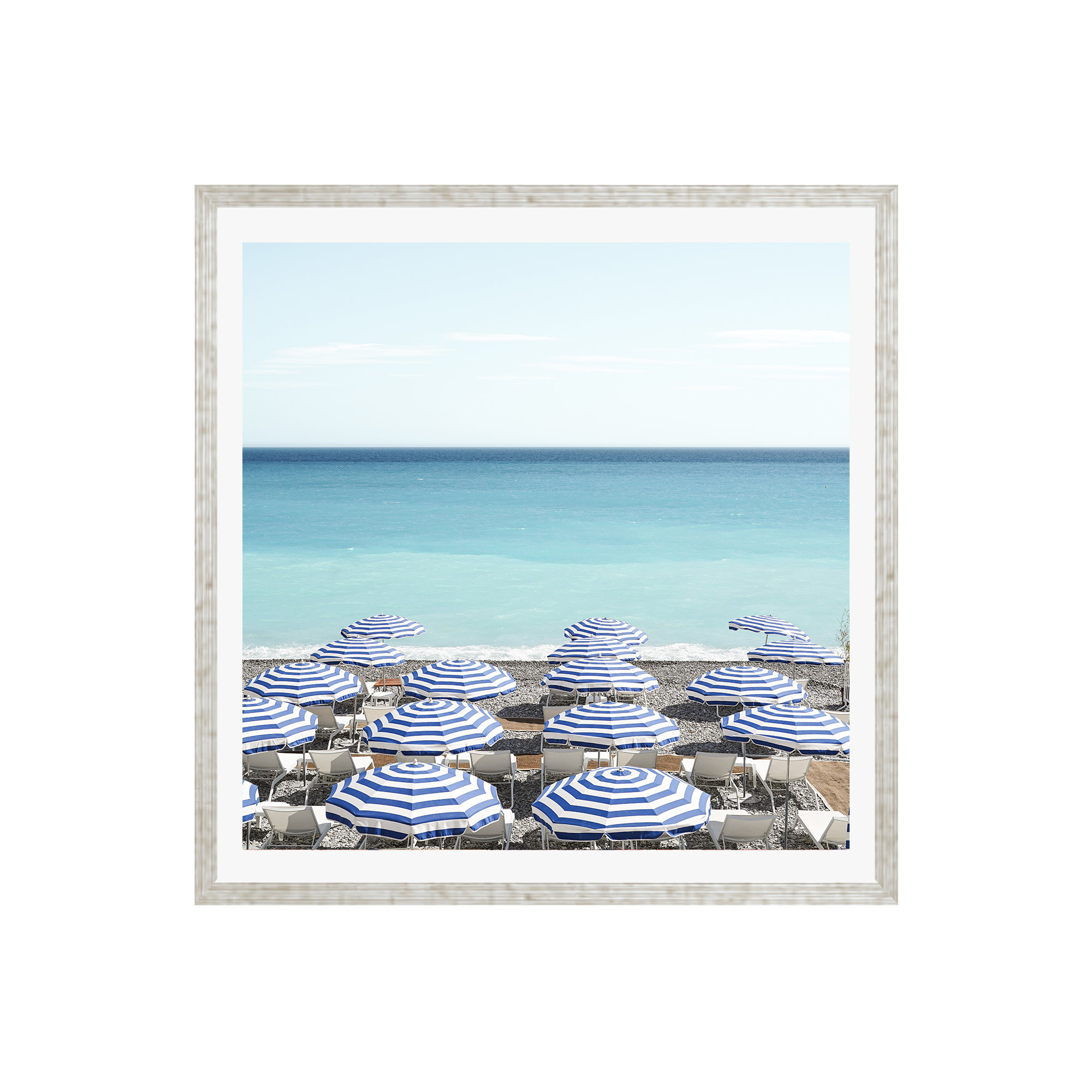 Blue Beach Umbrellas Photo by Henrike Schenk, 20" H x 20" W x 0.75" D, Silver Framed Paper, Yes