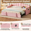 Lit de jour simple rose revêtu de velours, avec couchette escamotable et poches de type C pour les télécommandes