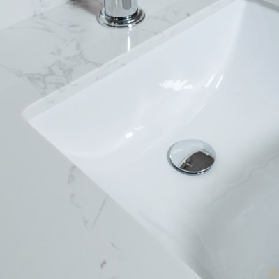 Dessus de meuble-lavabo en pierre Carrara
