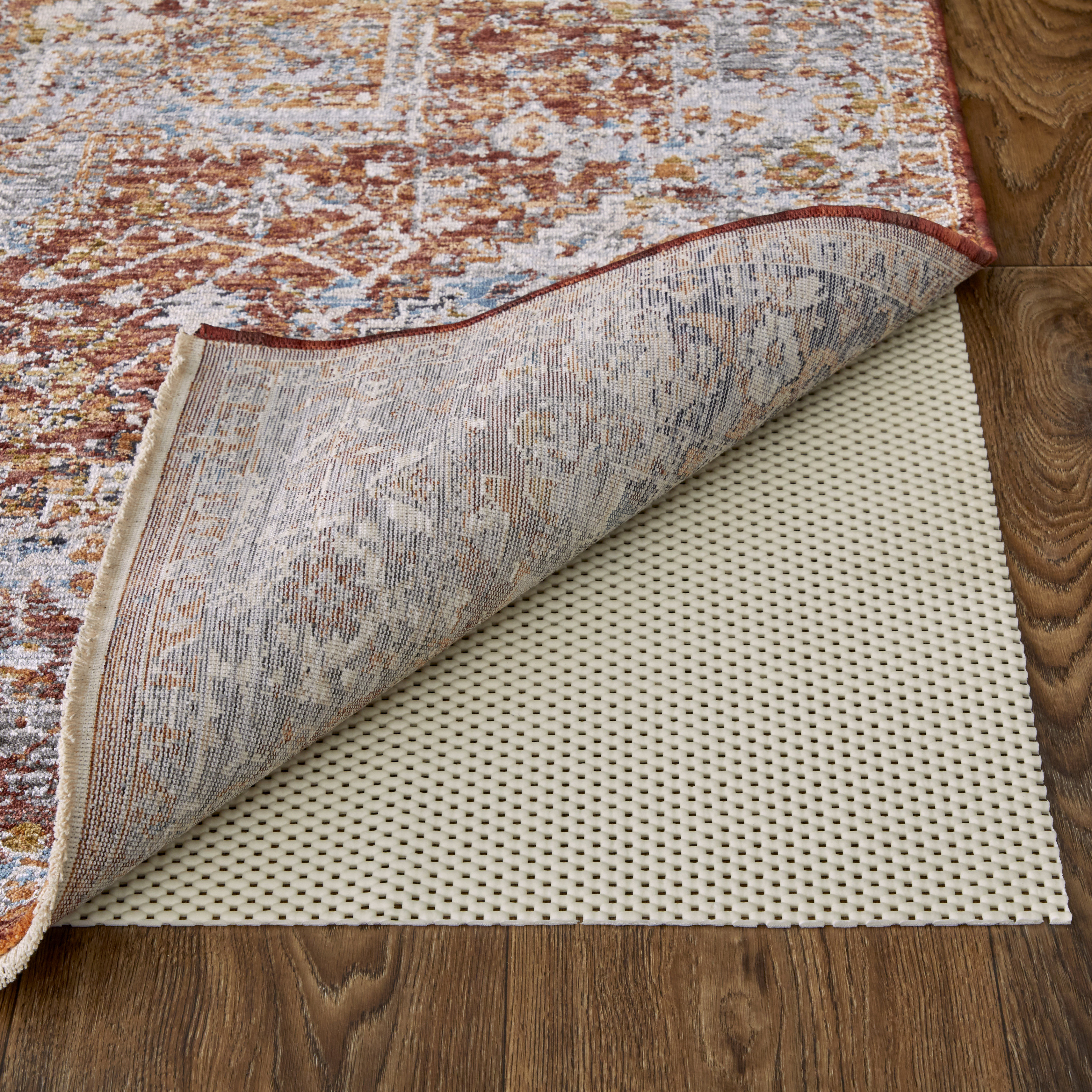 https://assets.wfcdn.com/im/45227415/compr-r85/2457/245738684/lykes-001-thick-rug-pad.jpg