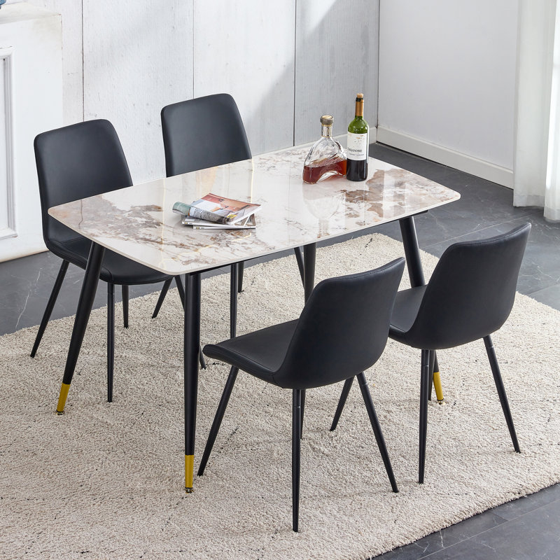 Ensemble de table de salle à manger moderne en pierre frittée blanche avec 4 chaises en cuir synthétique
