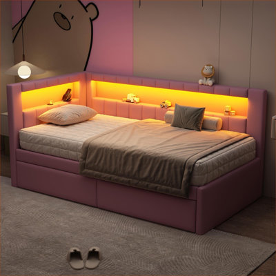 Pink-toned upholstered twin size storage platform bed with wooden frame, LED lighting and built-in USB ports