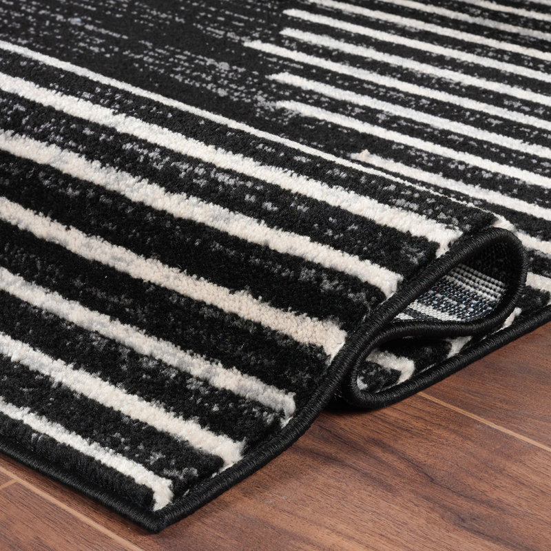 Malica Geometric Machine Woven Polypropylene Area Rug in Black/Ivory, Rectangle 7'10" x 10'