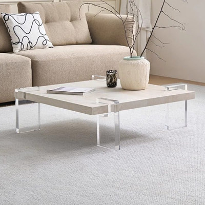 Table basse haut de gamme en ardoise avec pieds en acrylique