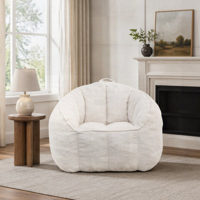 Pouf géant en velours côtelé confortable avec accoudoirs pour un confort et un soutien optimaux.